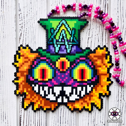 Alison Wonderland mad hatter perler necklaced by leaky pixels. Cheshire cat eyes and mouth with a third eye. Alison Wonderland logo on top hat.