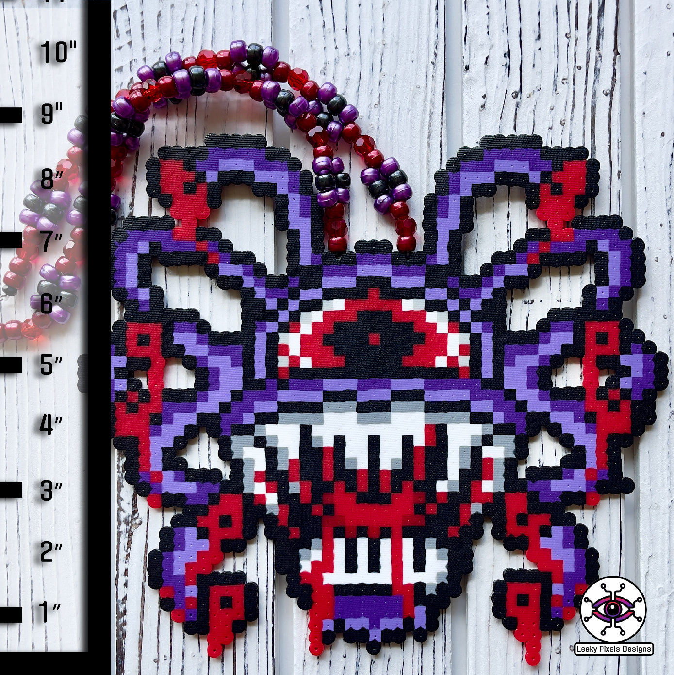 blood cyclops perler necklace by leaky pixels