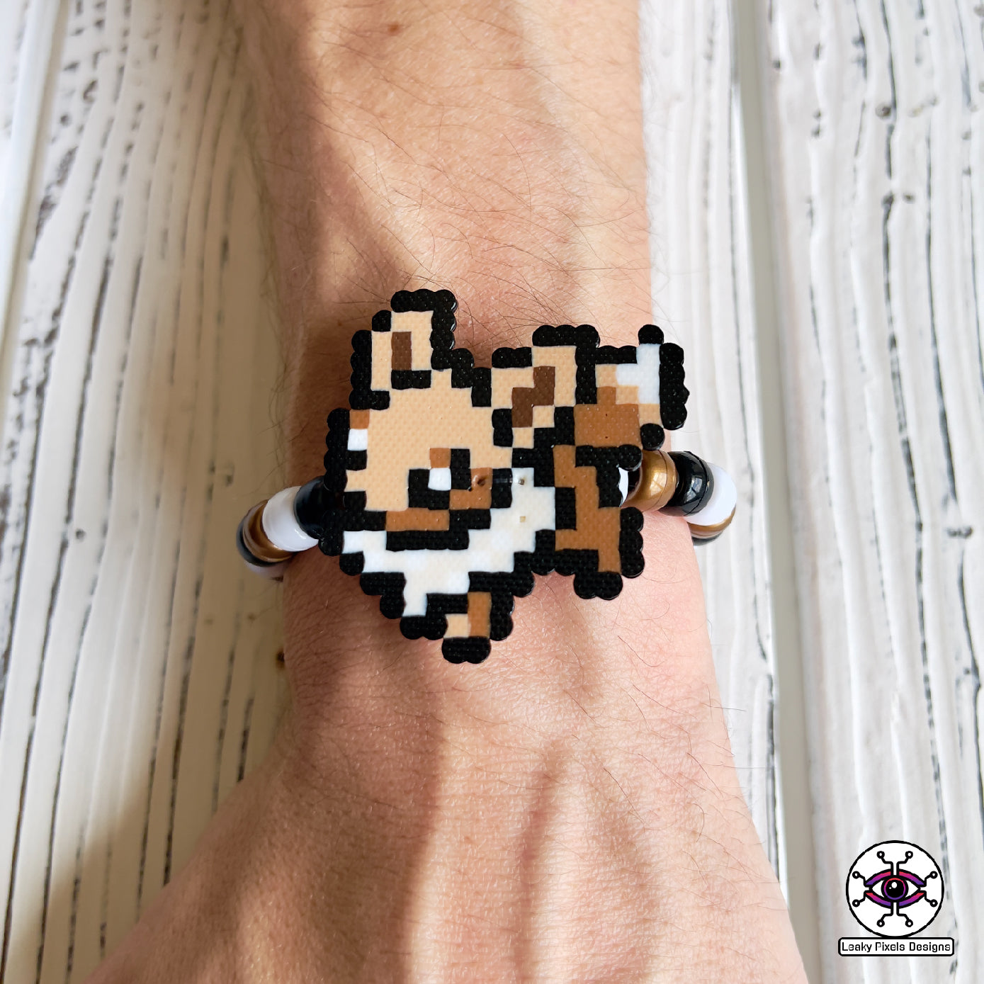Eeevee pokemon evolutions perler bracelets. Vaporeon, Jolteon, Flareon, Espeon, Umbreon, Leafeon, Glaceon, and Sylveon by leaky pixels.