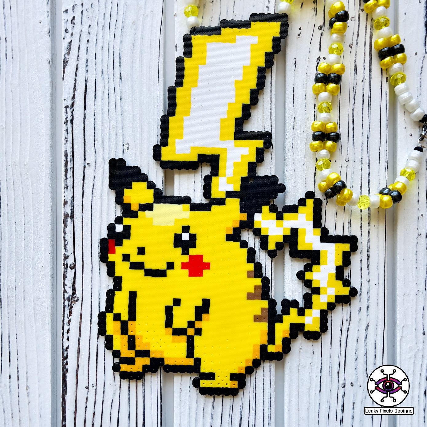 Gigantamax pikachu perler necklace by leaky pixels