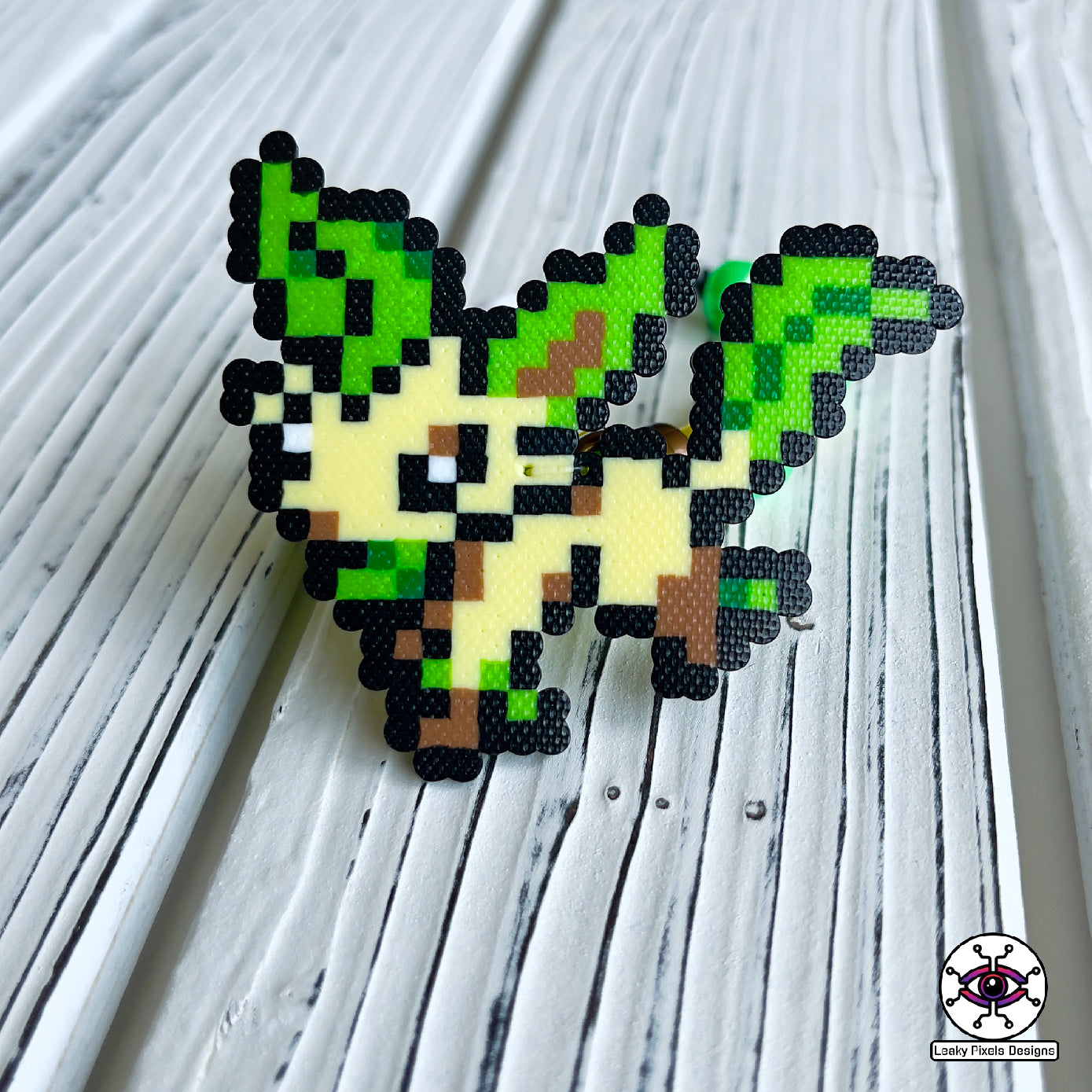 Eeevee pokemon evolutions perler bracelets. Vaporeon, Jolteon, Flareon, Espeon, Umbreon, Leafeon, Glaceon, and Sylveon by leaky pixels.