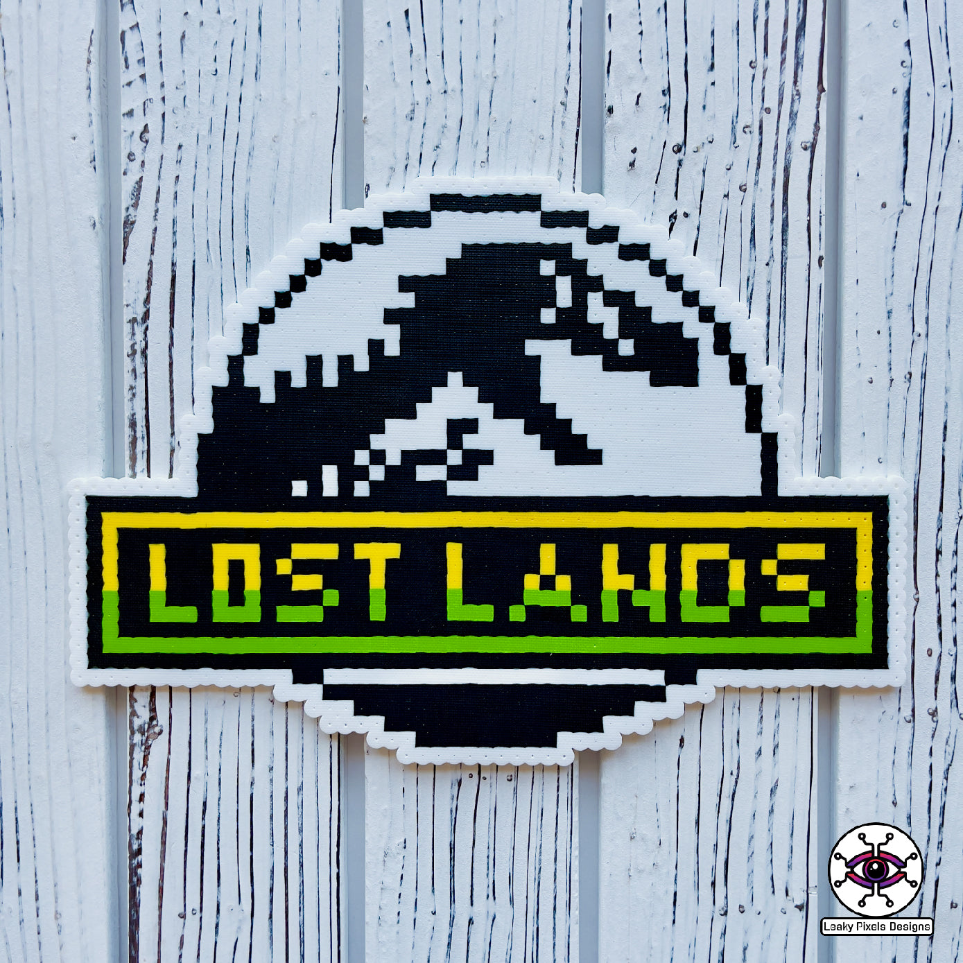 lost lands perler necklace excision by leaky pixels. has a jurassic park like trex