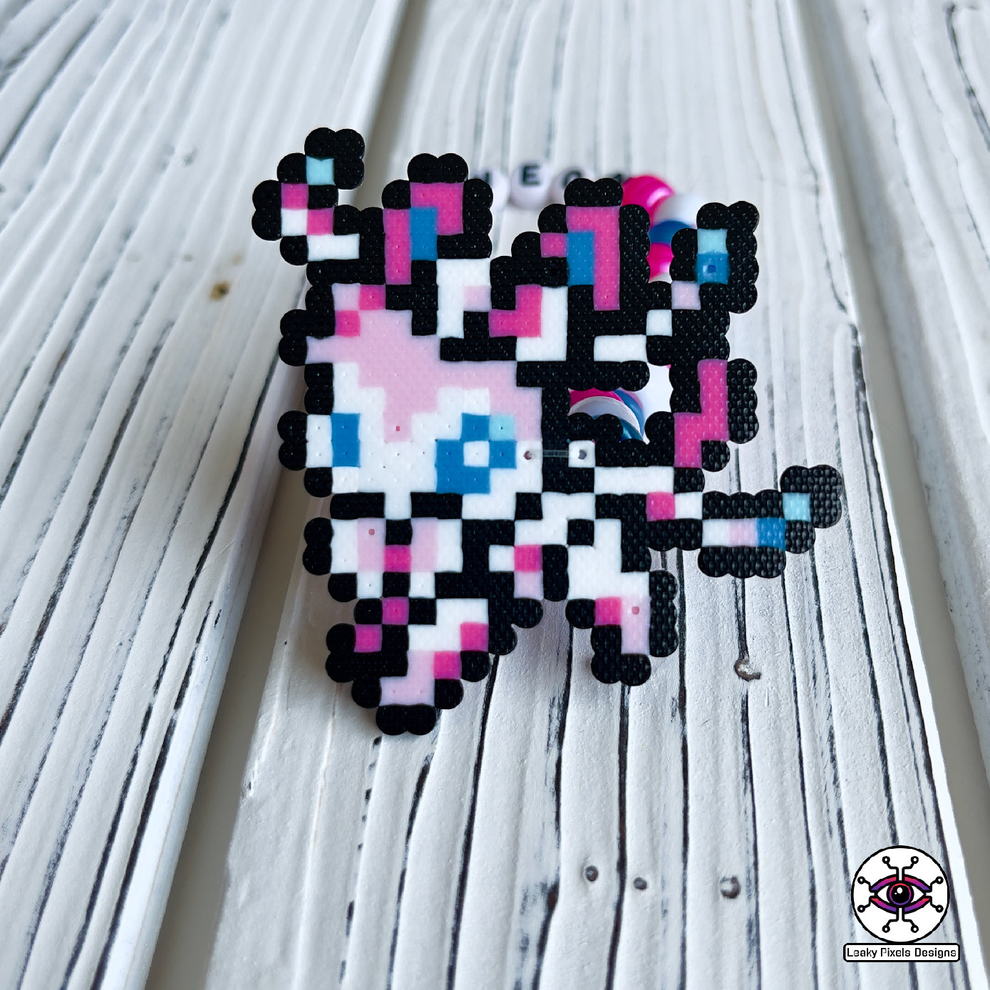 Eeevee pokemon evolutions perler bracelets. Vaporeon, Jolteon, Flareon, Espeon, Umbreon, Leafeon, Glaceon, and Sylveon by leaky pixels.