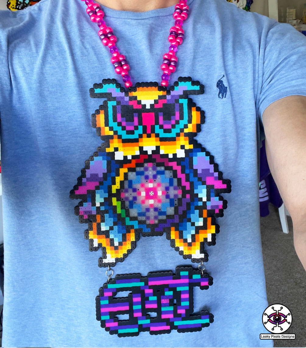 edc owl perler necklace. owl is different colors of the rainbow with the letters edc hanging from below