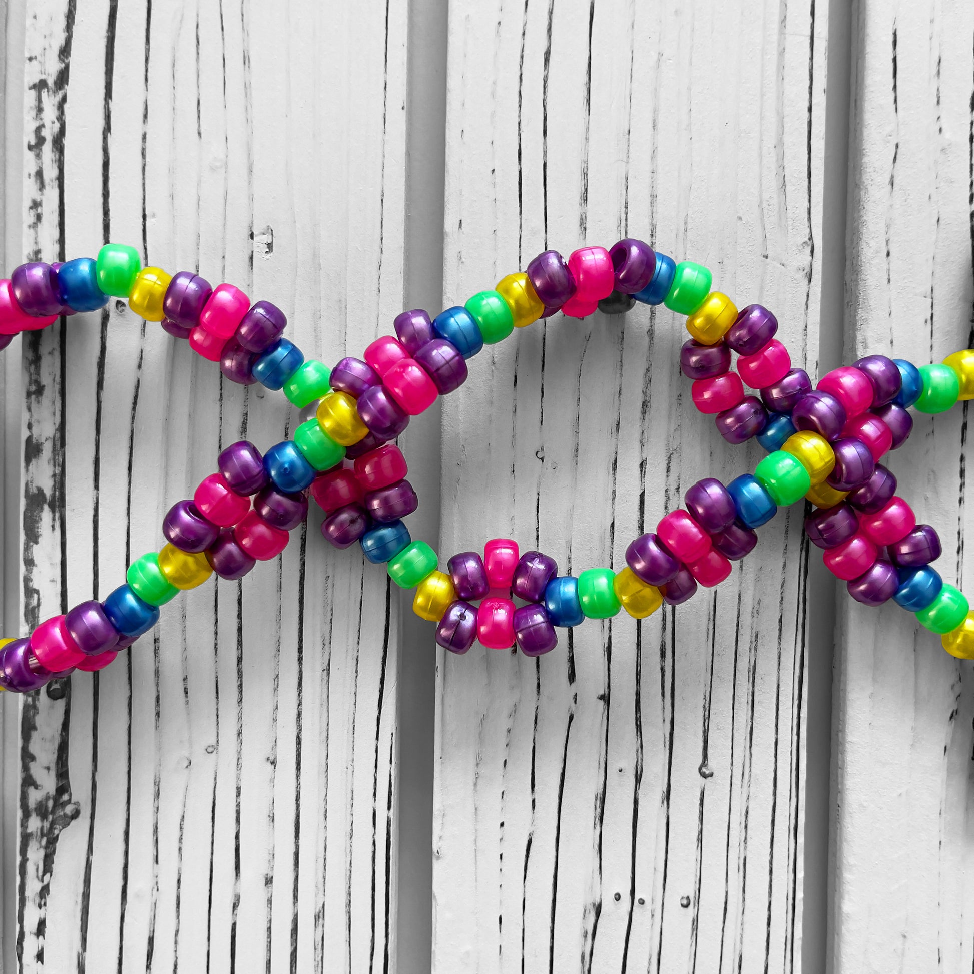 excision x rainbow perler necklace by leaky pixels