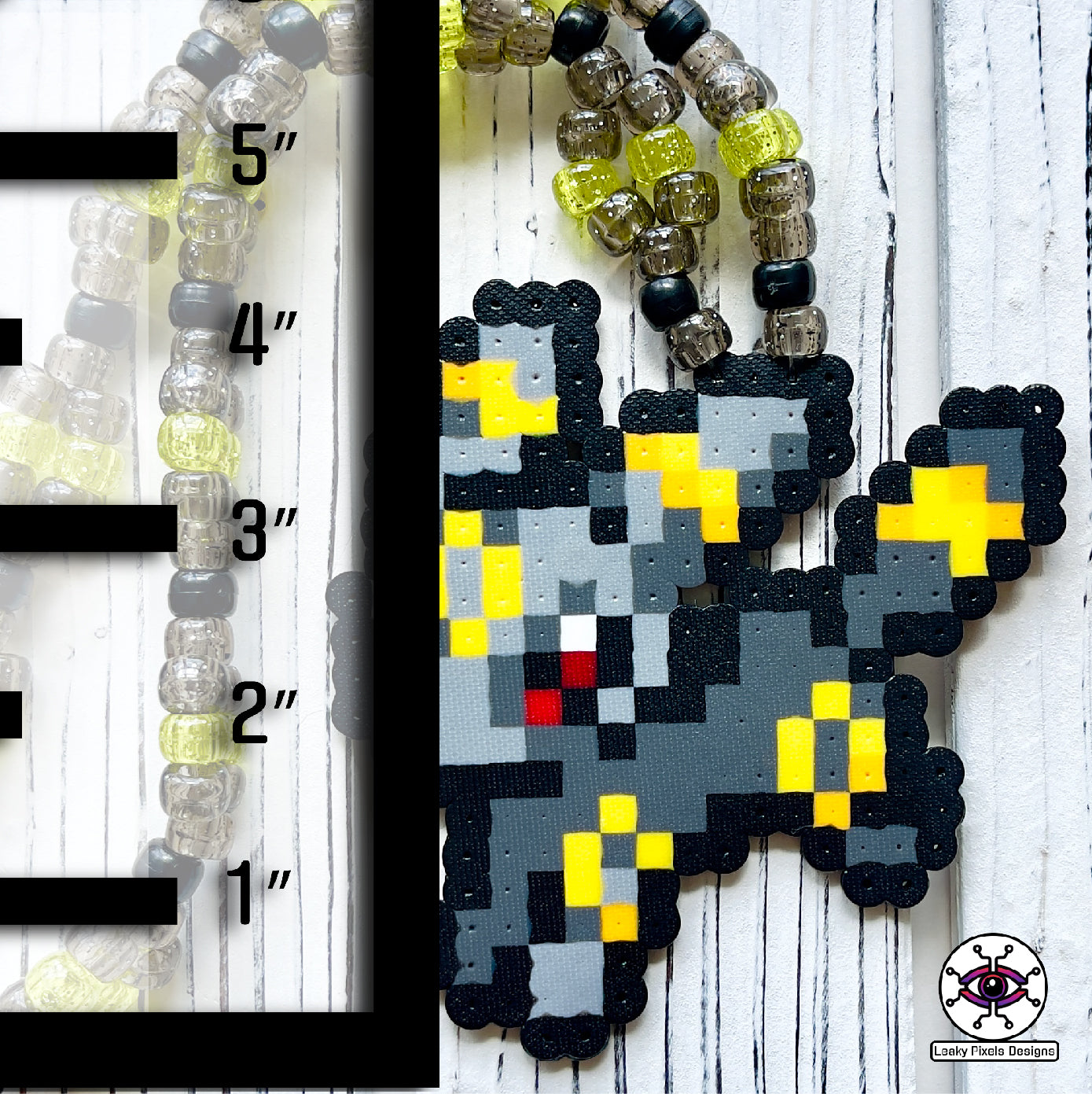 Umbreon pokemon perler necklace. eevee evolution. dark grey with red eyes and gold rings on its body. necklace is made of clear, black, and yellow glitter pony beads.