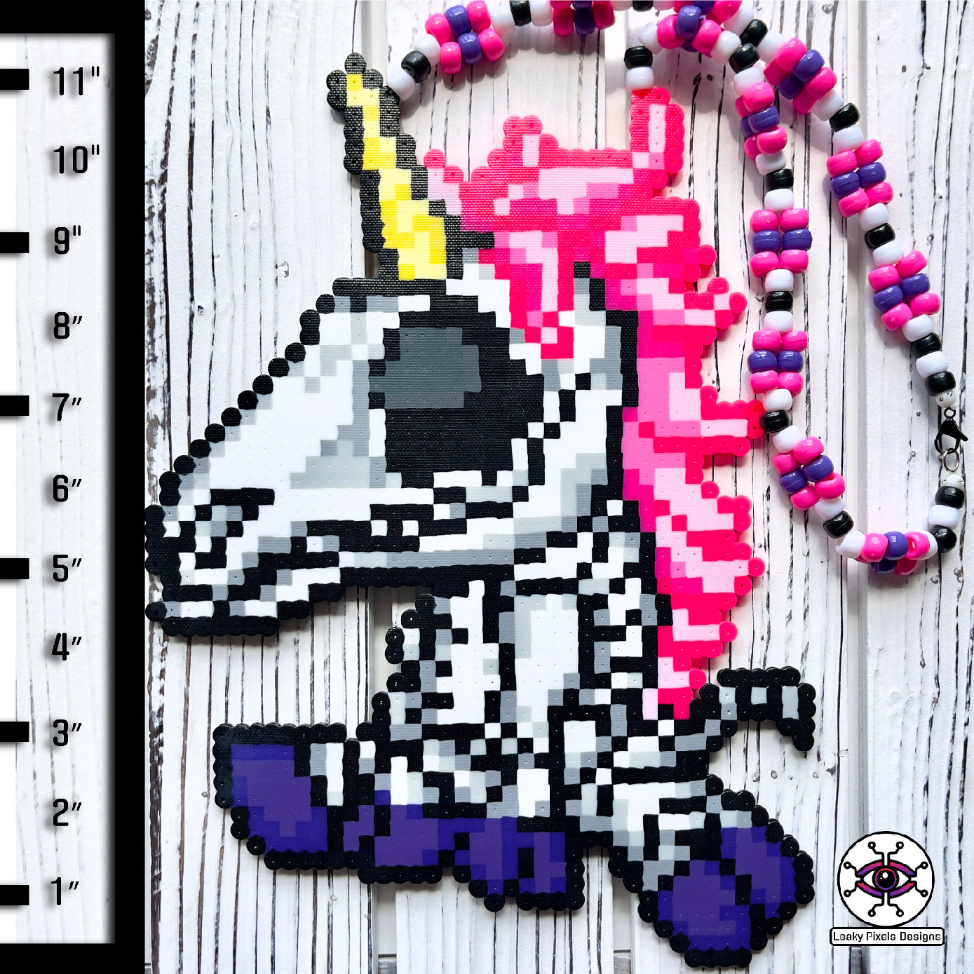 Unicorn skeleton perler necklace. purple hooves, pink hair and yellow horn by leaky pixels